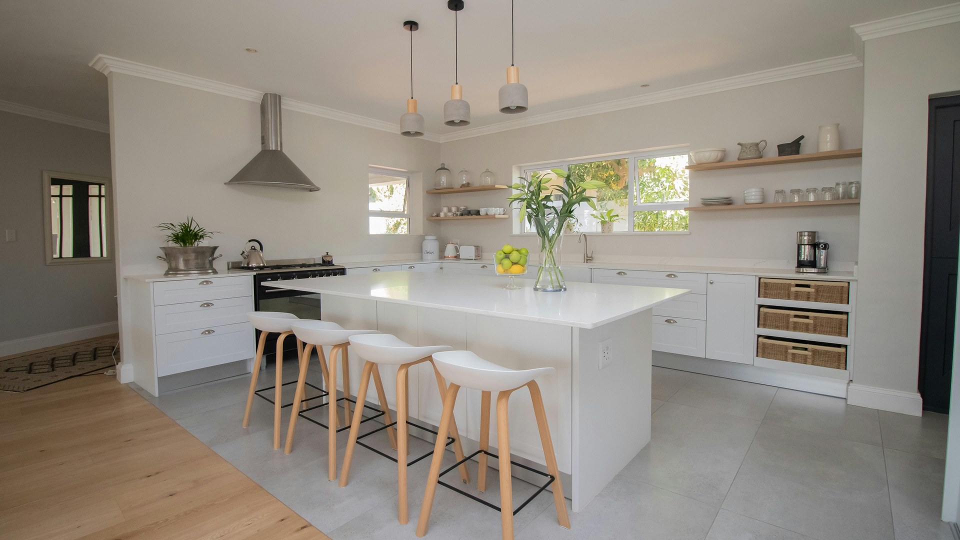 White Hamptons style kitchen with island bench